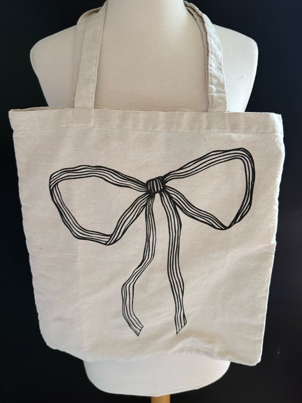 Natural Canvas Tote with Black Bow Graphic Reusable tote bag